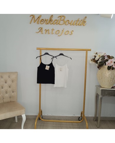 Camiseta Mágica: Tirante Fino, Tejido Elástico, Comodidad Suprema Camiseta Mágica: Tirante Fino, Tejido Elástico, Comodidad Suprema