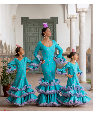 Vestido Aitana Lunar Niña turquesa con lunares rosas y volantes plisados flamencos