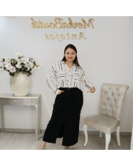 Falda Vaquera Negra Básica | Fondo de Armario Imprescindible