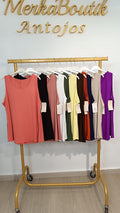Camiseta Canalé Curvy coral y varios colores en perchero